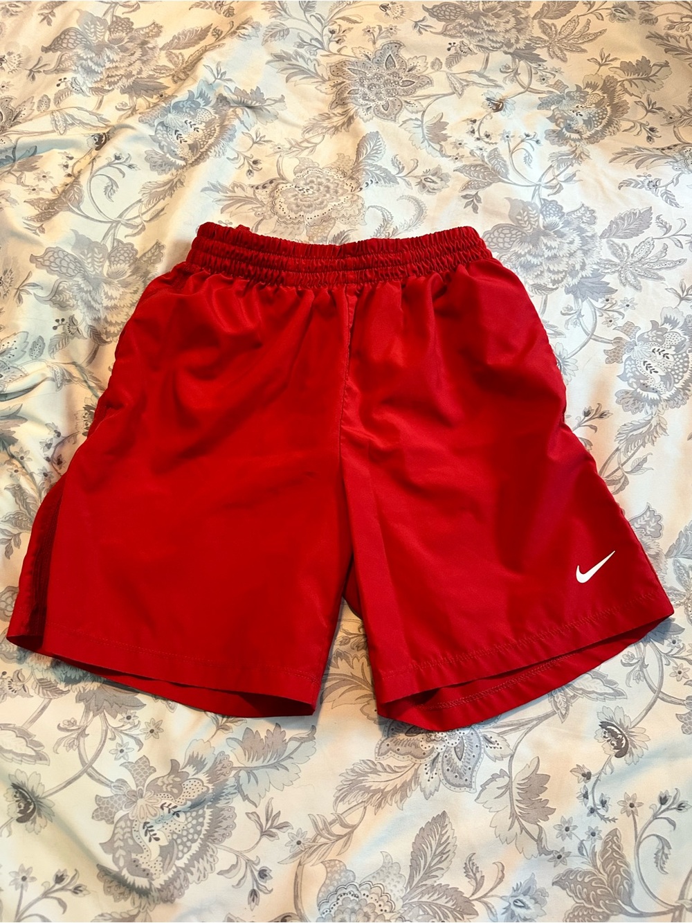 Nike Red Kids Athletic Shorts with White Swoosh